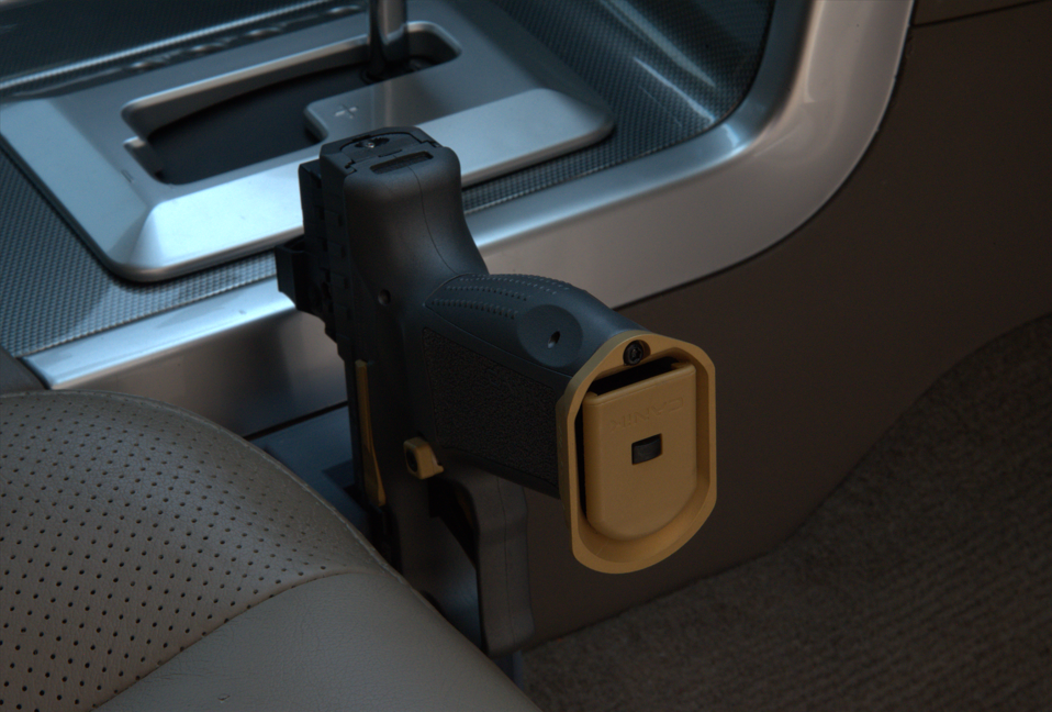 At The Ready quick-draw firearm mount installed inside a vehicle console area